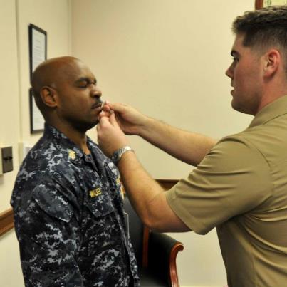 Photo: CMC Leon Walker receives his flu mist.