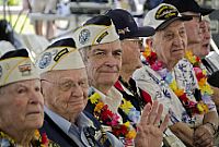 Pearl Harbor survivors observe the U.S. Naval Sea Cadets Concert Band of the West perform at the Pearl Harbor Visitor's Center during Kama'aina and military appreciation day.