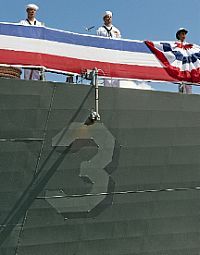 Sailors assigned to the Freedom-class littoral combat ship USS Fort Worth (LCS 3) man the rails during her commissioning in Galveston, Texas.