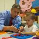 Secretary Duncan with a Hamburg Pre-Kindergarten student