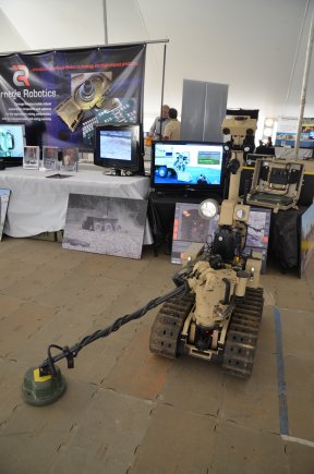 An unmanned vehicle is demonstrated at the Robotics Rodeo on Fort Benning, Ga. The 2012 Robotics Rodeo held at Fort Benning, June 20-29, 2012, allowed manufacturers to showcase the latest robotics technology designed to defeat battlefield threats, especially improvised explosive devices.