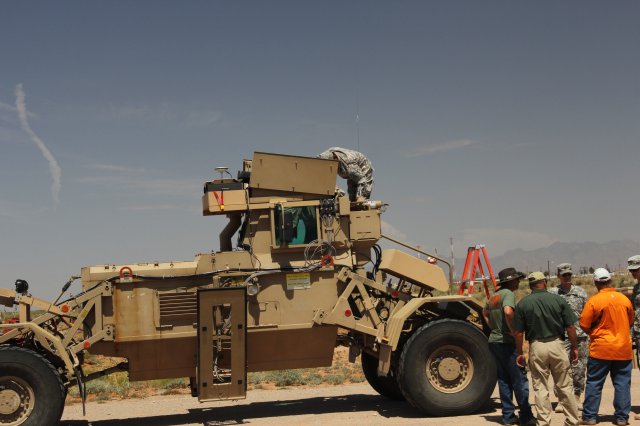 A Husky with an experimental Cause-and-Effect System trainer is prepared for a test run at McGregor Range, N.M., July 25, 2012. Soldiers in 3rd Battalion (Engineer), 364th Regiment, 5th Armored Brigade, Division West, helped evaluate the new trainer during a week of testing.