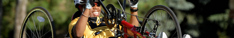 Woman competing in a handcycling race.