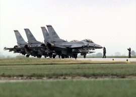 990521-F-4836T-001  Four U.S. Air Force F-16 Fighting Falcons line up at the end of the runway at Aviano Air Base, Italy, for final checks before taking off on NATO Operation Allied Force missions on May 21, 1999.  Operation Allied Force is the air operation against targets in the Federal Republic of Yugoslavia.  The aircraft are deployed to the 31st Air Expeditionary Wing at Aviano from the 20th Fighter Wing, Shaw Air Force Base, S.C.  DoD photo by Tech. Sgt. Steven A. Taylor, U.S. Air Force.  (Released) 