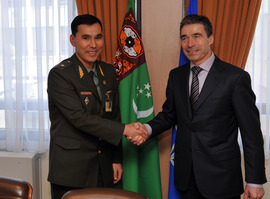 Left to right: The Minister of Defence of Turkmenistan, Major General Yaylym Berdiyev, shaking hands with NATO Secretary General, Anders Fogh Rasmussen.