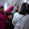 Children point to fallen service member's name [Image 1 of 5]