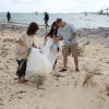 Uken Beach brightened by service, community members