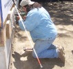 Volunteer who is blind uses power drill on ABILITY House