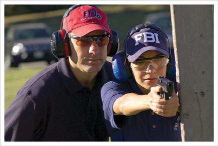 FBI agent and student at firing range