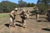 Small-unit leaders guide Marines through live-fire training