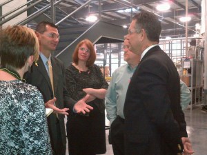 Deputy Assistant Secretary Kim Glas and Under Secretary Francisco Sanchez tour Unifi's sewing thread manufacturing facility in Yadkinville, North Carolina on October 9, 2012.