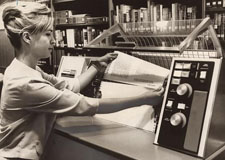 To the rescue, many librarians believe computers are the only means to effectively cope with their bulging bookshelves