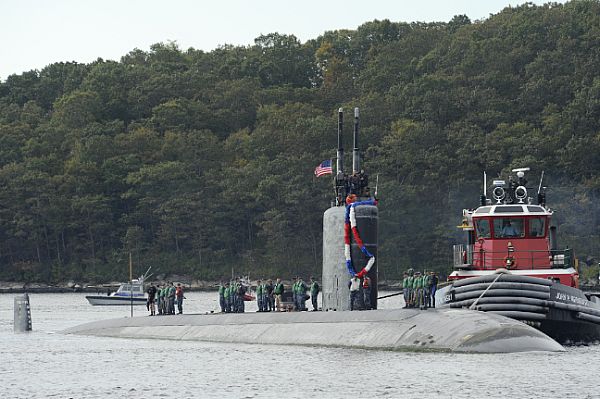 The Los Angeles-class attack submarine USS Toledo (SSN 769) is underway in the Thames River on its way home to Submarine Base New London after a seven-month deployment in the 6th fleet area of operations.