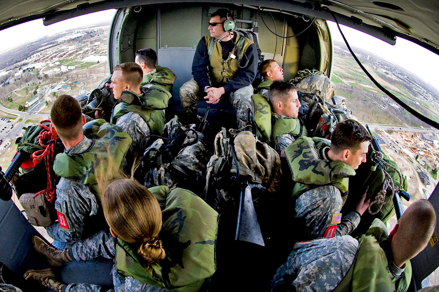 Four teams of Sapper competitors are loaded onto a Black Hawk helicopter and flown to the helocast drop zone during phase two of the Best Sapper competition