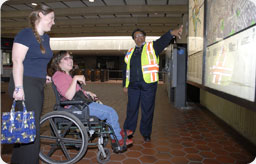 Photograph of a wheelchair user in the Metrorail system
		