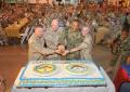 Cutting the birthday cake during the Navy Birthday Ball