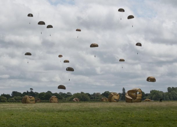 Task Force 68, which is made up of paratroopers from U.S., Germany, France, Holland, and United Kingdom, re-enacted the D-Day airborne operation on the La Fiere fields near Ste. Mere Eglise, France, to commemorate the heroic acts of the World War II paratroopers who made the jump 68 years ago. After the jump, the task force marched into the town of Ste. Mere Eglise to the sounds of cheers from the locals. Task Force 68 is in Normandy, France, to commemorate the 68th anniversary of D-Day.