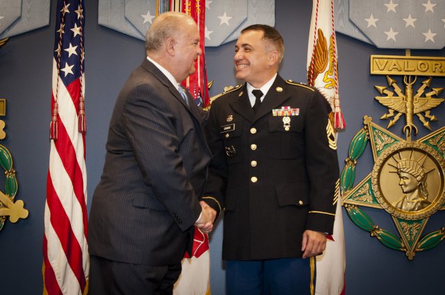 Under Secretary of the Army Joseph W. Westphal presented Master Sgt. Arnaldo Caban-Cruz with the Army Reserve Career Counselor of the Year award, during the fiscal year 2012 Secretary of the Army Career Counselor and Recruiter of the Year Awards, June 19, 2012, at the Pentagon.