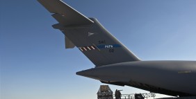 Aerial porters remove pallets from a C-17 Globemaster III after a recent Swedish mission.