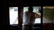 President Obama Waves To People Along The Road In Decorah, Iowa