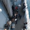 USS Mobile Bay sailors move supplies [Image 1 of 2]