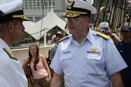 Commander, Coast Guard District 5 chats with Commander, Carrier Strike Group 2