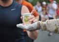 Marines give cups of motivation to runners