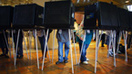 Early voters fill out their ballots as they cast their vote in the presidential election on the first day of early voting on October 27, 2012 in Miami, Florida