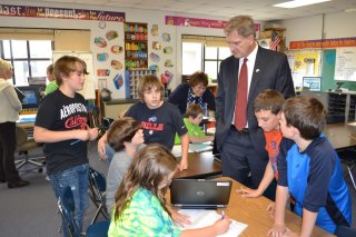 Photo: Congressman Owens visits with students at Ogdensburg's John F. Kennedy school.