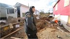 Michael Terrasi outside his damaged home