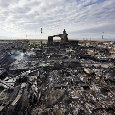 Photo: New estimates put the damage caused by Hurricane Sandy at as much as $50 billion in economic damage, with about $10 billion to $20 billion of insured losses. | http://bloom.bg/TcZlq7

PHOTOS: Intense scenes of devastation from the aftermath of Hurricane Sandy | http://bloom.bg/TcZkSO 

Below: the charred foundations of 80 to 100 buildings at Breezy Point, a coastal neighborhood in the Queens borough of New York. (Scott Eells/Bloomberg)