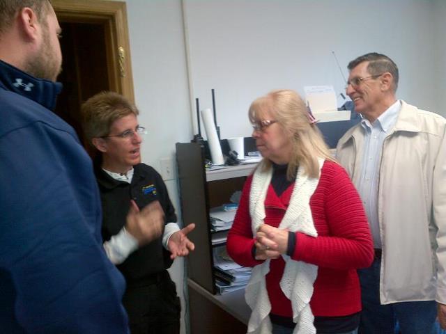 Photo: Staff members with Rep. McKinley's office meet with residents and first responders at the Preston County Disaster Relief Center to discuss the relief and cleanup efforts.