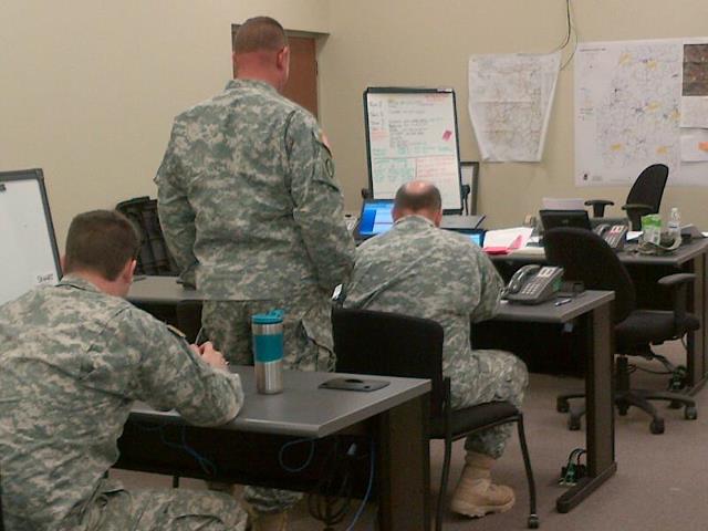 Photo: Staff members with Rep. McKinley's office meet with members of the National Guard stationed in Kingwood, W.Va.  Preston County was hit hard with snowfall as a result of Hurricane Sandy.