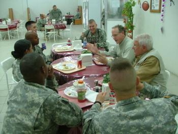 Eating lunch with Soldiers from Texas at Camp Victory Baghdad Iraq 