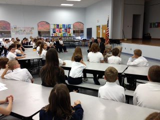 Photo: Speaking to fourth and fifth graders at Lake Michigan Catholic with Sen. John Proos