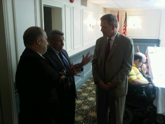 Rep. Bill Owens (D) (right) speaks with MP Guy Lauzon (center) and Cornwall Economic Development Officer Bob Peters (left) ahead of a closed-door meeting on cross-border business. Photo: Bill Kingston