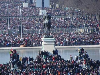 Spectators climb the General Ulysses S. Grant Memorial for a better view