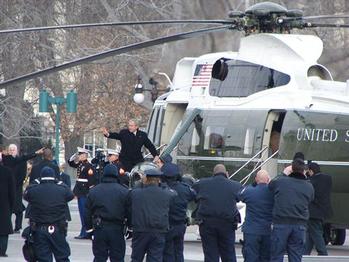 44th President salutes the 43rd President as he departs for Texas