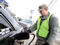 A National Guardsman Pumps Gas for Residents From a Tanker