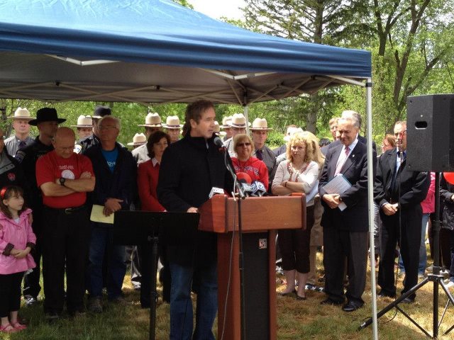 Photo: Brian addresses the crowd at the Flight 3407 memorial dedication and 5K race