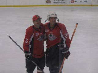 Photo: Brian with Congressional Hockey Caucus Co-Chair Rep. Quigley at the USA Warriors vs. Lawmakers Hockey game