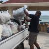 Uken Beach brightened by service, community members [Image 1 of 5]