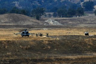 Photo: Members of the 129th Rescue Squadron provide aerial assets to support a personnel recovery mission during an evacuation scenario-based exercise at Soaring Angel 13-1, Fort Hunter Liggett, Calif., Oct. 11, 2012.Soaring Angel 13-1 is a collaborative tactical training exercise hosted by the 129th Rescue Wing designed to demonstrate the wing’s rescue and deployable capabilities and interoperability with joint forces. (Air National Guard photo by Staff Sgt. Kim E. Ramirez)