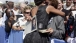 First Lady Michelle Obama Hugs A Guest Following Ceremony