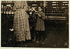 Little Fannie, 7 years old, 48 inches high, helps sister in Elk Mills. Her sister (in photo) said, "Yes, she he'ps me right smart. Not all day but all she can. Yes, she started with me at six this mornin'."  ... Location: Fayetteville, Tennessee (LOC) by The Library of Congress