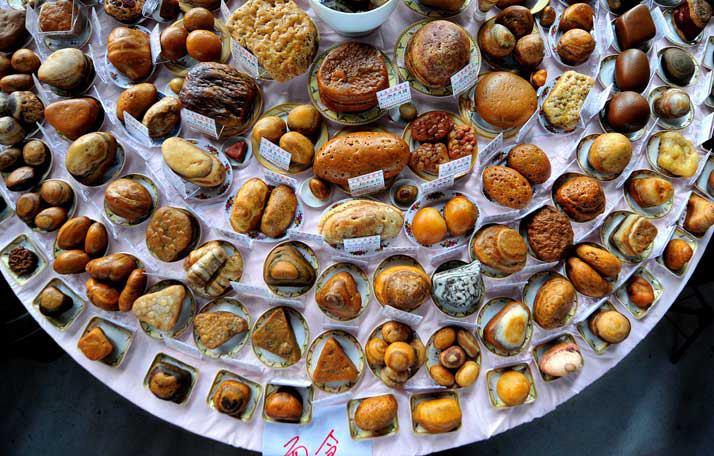 Photo: Mouthwatering perfection!!! Here's a "banquet" of stones resembling food, at a (2011) Rare Stone Festival in Liuzhou, China. Thanks to Huang Xiaobang