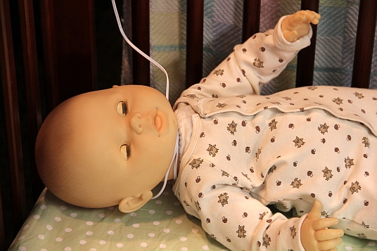 Baby strangles in a video monitor cord