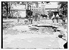 Damage by burst main, 129th St. (LOC) by The Library of Congress