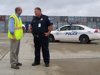 Boustany Speaks with Harbor Policeman at the Port of Lake Charles