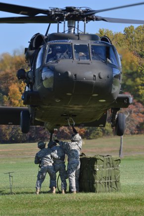 Soldiers of the 101st Airborne Division (Air Assault) practice sling-load operations, Oct. 16, 2012, at the Sabalauski Air Assault School at Fort Campbell, Ky. The course helps Soldiers further develop physical and mental discipline as they learn sling-load operations, rappelling and fast-rope techniques.